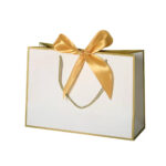 Gold and white plain paper bag with ribbon