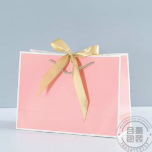 Pink and white plain paper bag